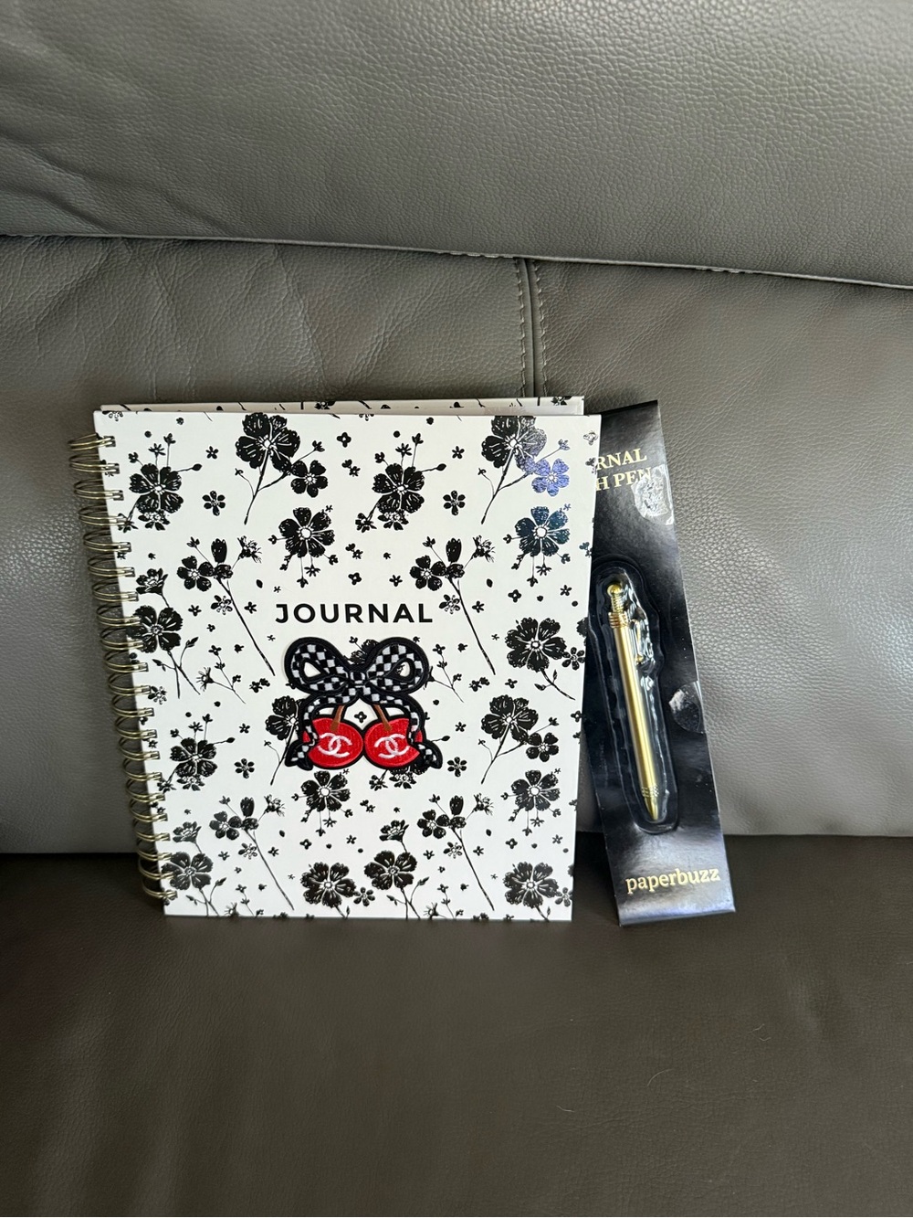 Journal with Black Floral Design and Red Accent